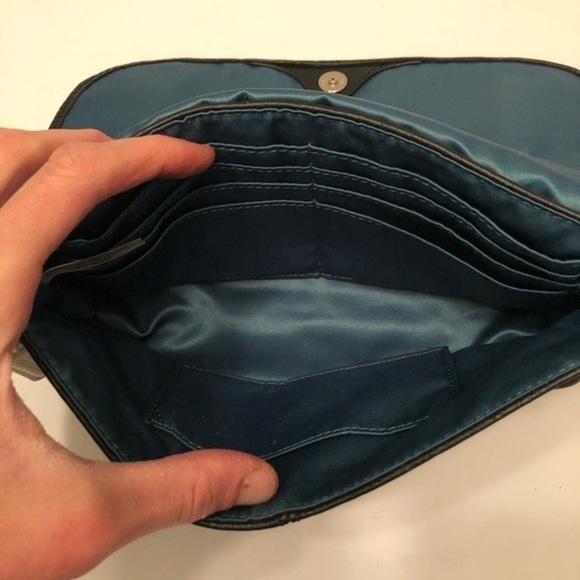 Coach black leather mini clutch wristlet bag